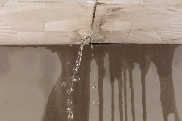 Professional Water Damage Restoration technician working in Millinocket, ME